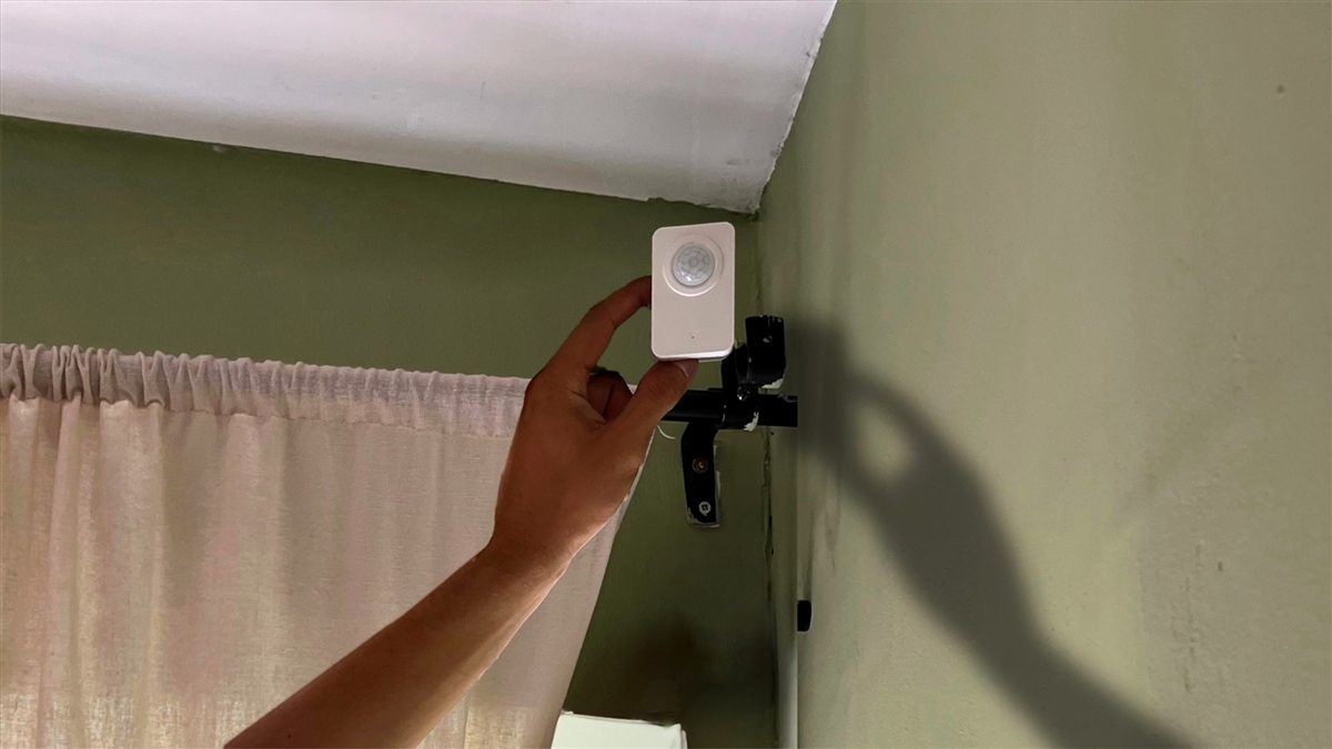 Motion sensor being placed near a curtain